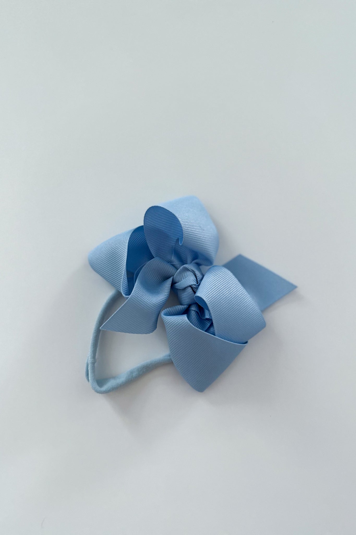 beyond creations millenium blue large bow headband